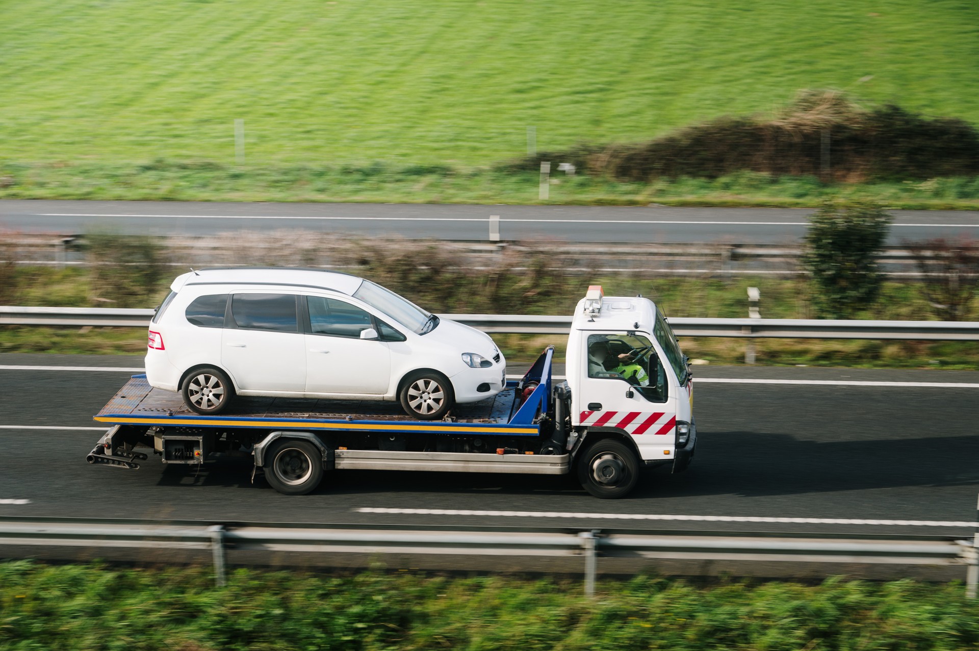 Tow truck with car